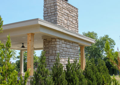 Expertly-landscaped LawnScapes outdoor project with decorative plants and stonework.