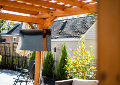 Expertly-landscaped LawnScapes outdoor project with decorative plants and stonework.