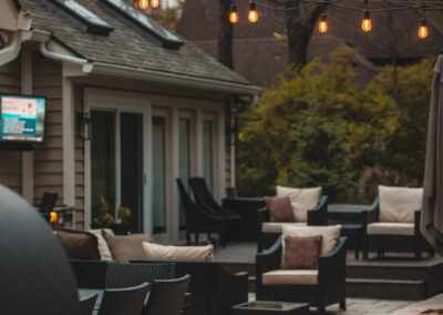 Expertly-landscaped LawnScapes outdoor project with decorative plants and stonework.