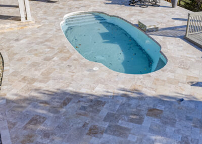 Expertly-landscaped LawnScapes outdoor project with decorative plants and stonework.