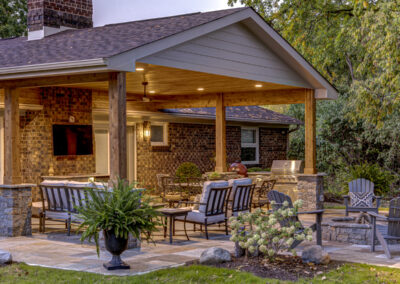 Expertly-landscaped LawnScapes outdoor project with decorative plants and stonework.