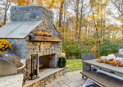 Expertly-landscaped LawnScapes outdoor project with decorative plants and stonework.