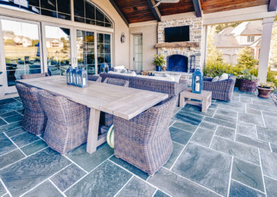 Expertly-landscaped LawnScapes outdoor project with decorative plants and stonework.