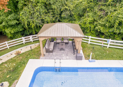 Expertly-landscaped LawnScapes outdoor project with decorative plants and stonework.