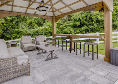 Expertly-landscaped LawnScapes outdoor project with decorative plants and stonework.