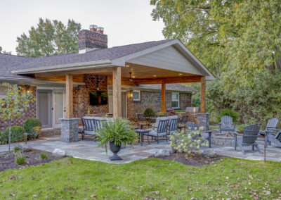 Expertly-landscaped LawnScapes outdoor project with decorative plants and stonework.