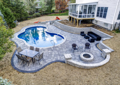 Expertly-landscaped LawnScapes outdoor project with decorative plants and stonework.