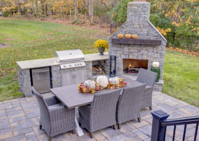 Expertly-landscaped LawnScapes outdoor project with decorative plants and stonework.