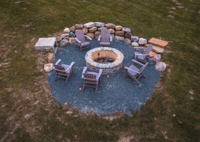 Expertly-landscaped LawnScapes outdoor project with decorative plants and stonework.