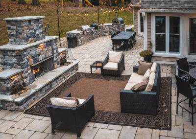 Expertly-landscaped LawnScapes outdoor project with decorative plants and stonework.